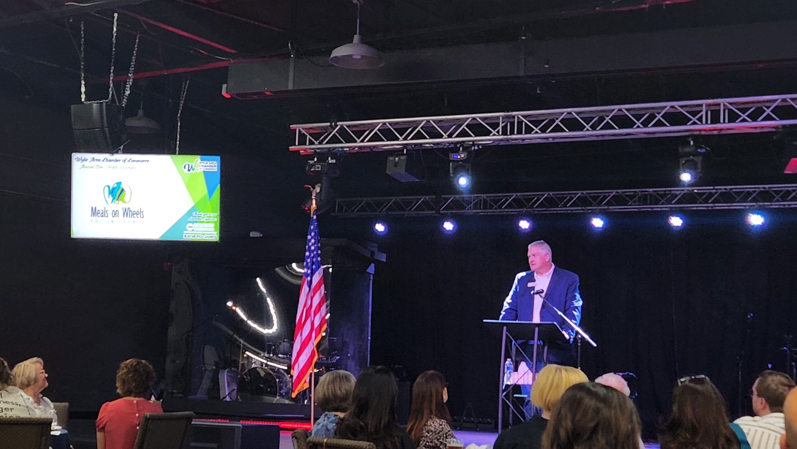 Representative from Meals on Wheels Collin County speaking at the Wylie Chamber nonprofit luncheon